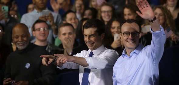 South Bend Mayor Pete Buttigieg acknowledges attendees with his husband Chasten Buttigieg after announcing his presidential candidacy for 2020 during an event on Sunday, April 14, 2019 in South Bend, Indiana.