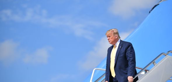 US President Donald Trump steps off Air Force One upon arrival at Joint Base Andrews in Maryland on June 19, 2019.