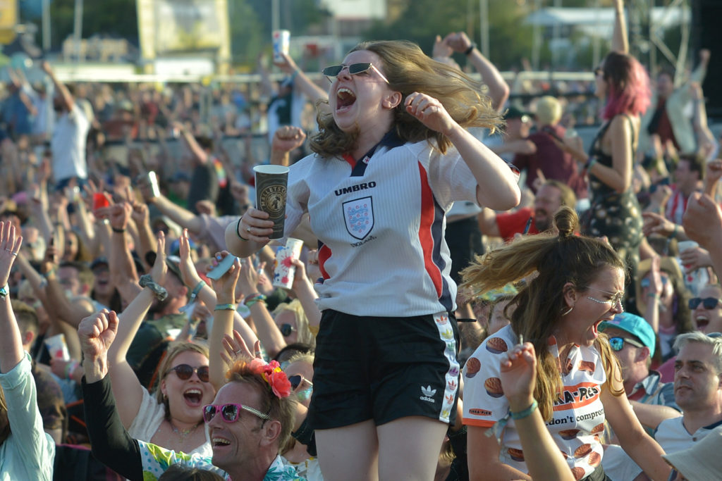 Lesbian football fan Beth Miles celebrates at the Women's World Cup screening
