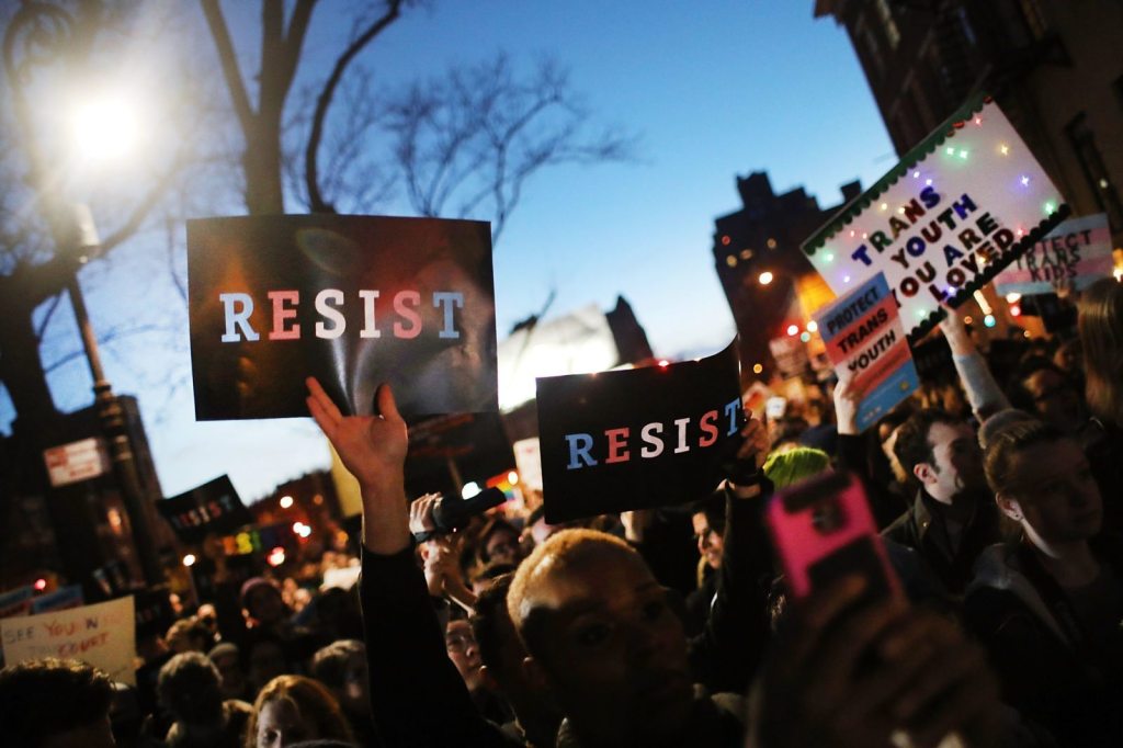 Anti-Trump protesters rally outside the Stonewall Inn in 2019  (Photo by Spencer Platt/Getty Images)