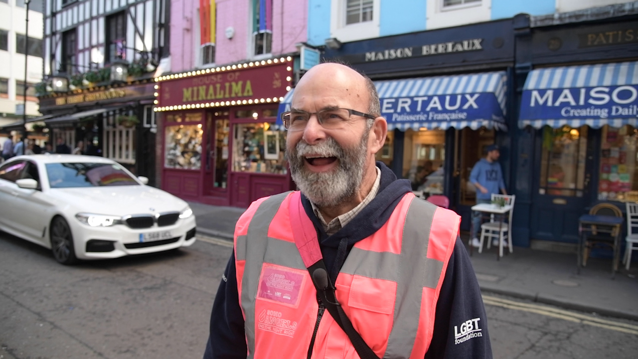 Dave has a laugh on a shift with the Soho Angels in London (PinkNews)