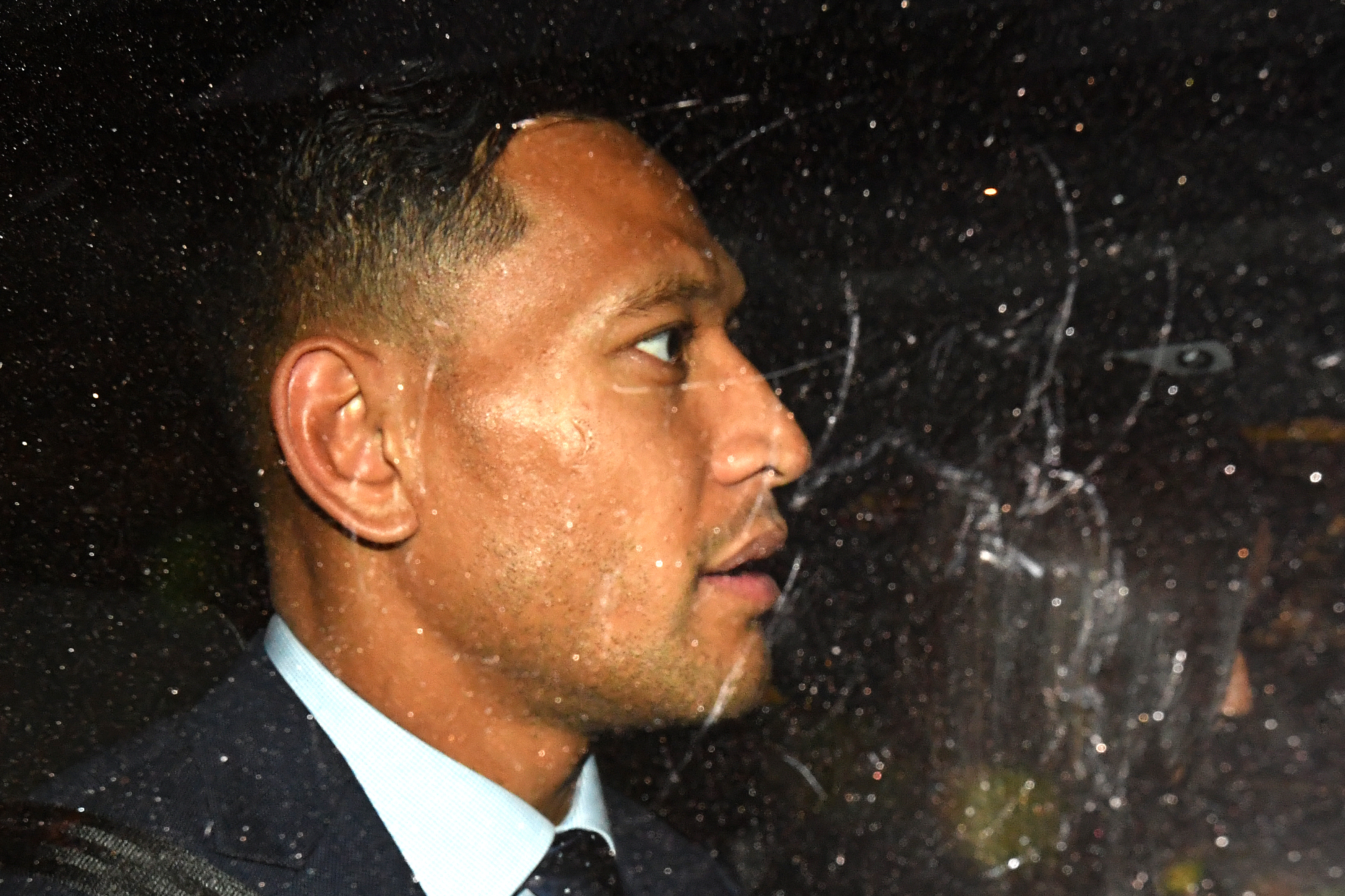 Israel Folau in the back of a car