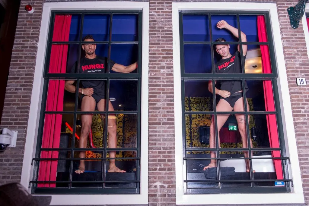 Male sex workers are taking over the windows for Amsterdam Pride 