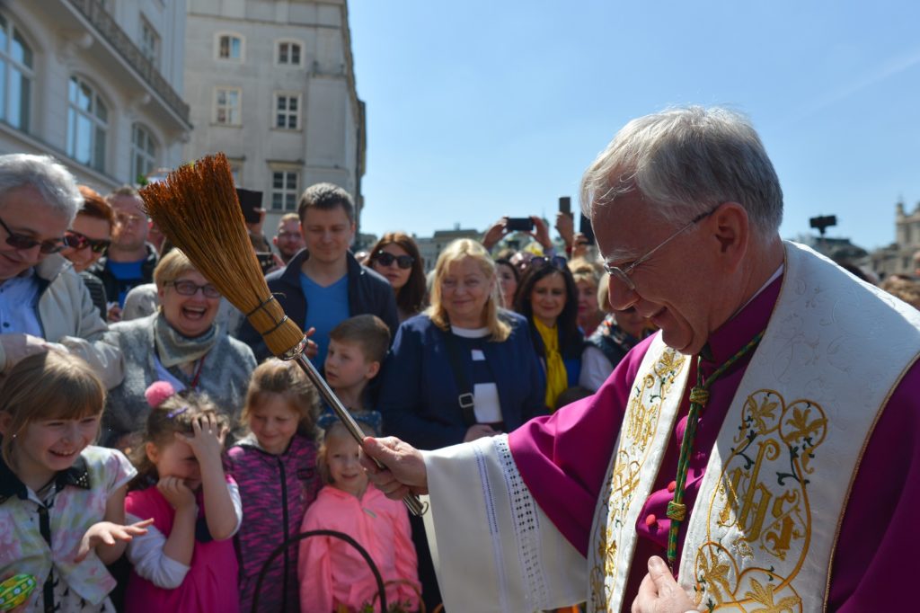 Baskets containing a sampling of Easter food are brought outside Mariacki Basilica in Krakow are blessed on Holy Saturday by the Archbishop of Krakow, Marek Jedraszewski. 