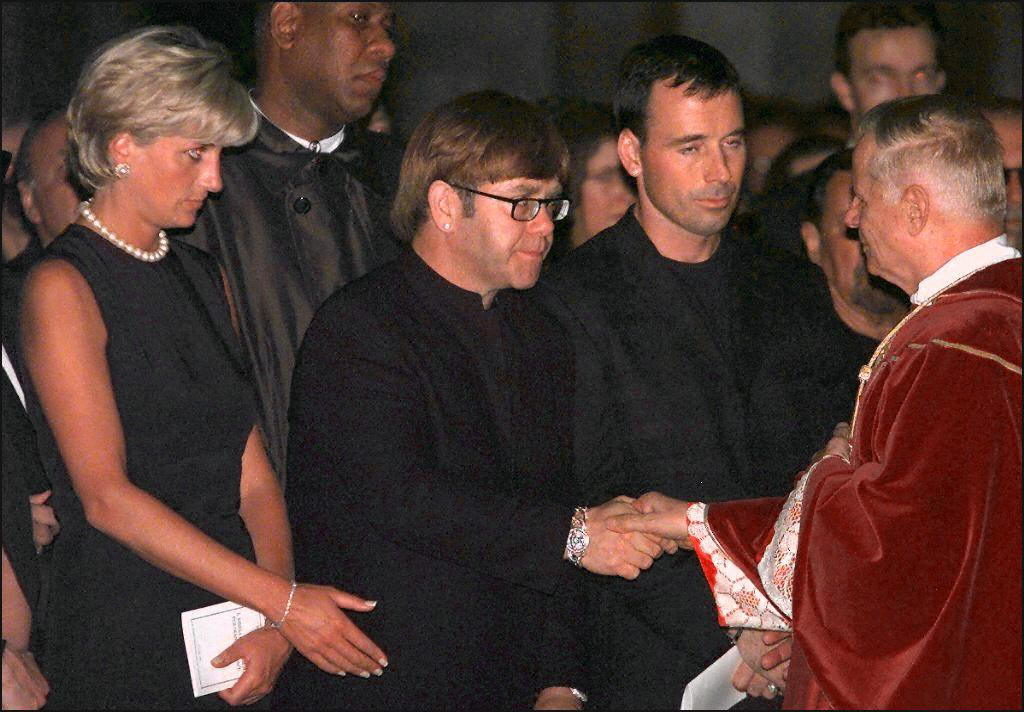 Elton John and Princess Diana at a service for the late Gianni Versace. 