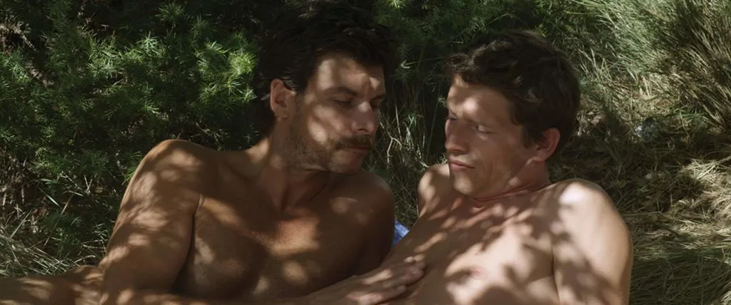 Two men in a gay love scene. Michel (Christophe Paou) meets Franck (Pierre Deladonchamps).