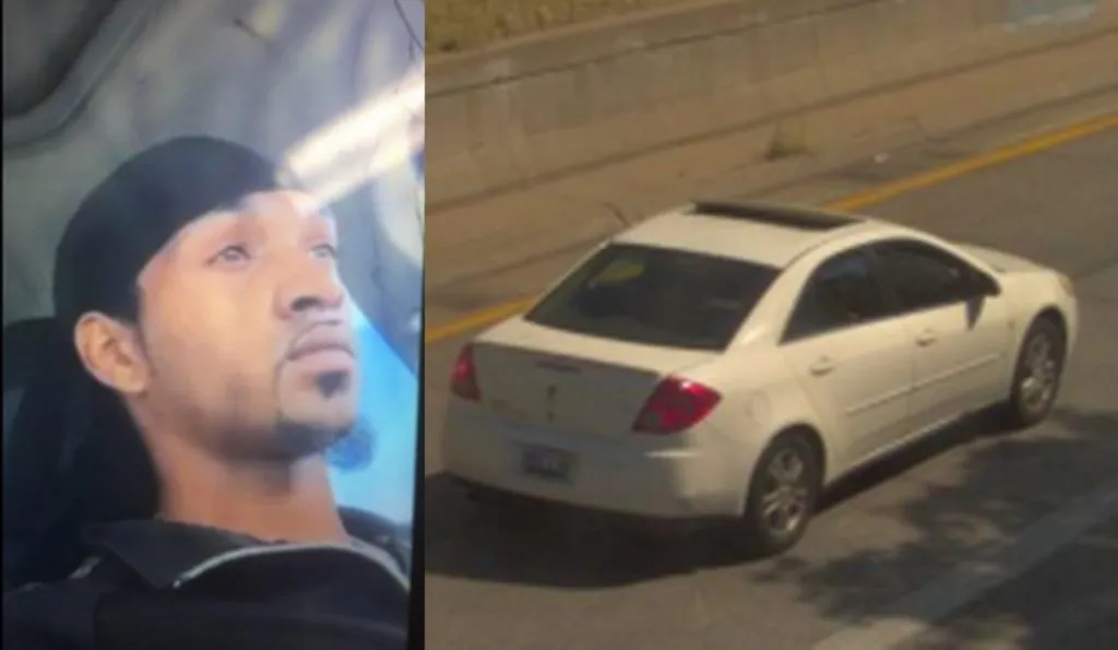 A photo of a man distributed by investigations in connection to the homicide alongside a car. (Kansas City police department)