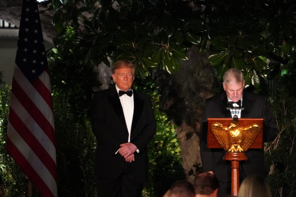 Reverend Franklin Graham gives a blessing as US President Donald Trump stands alongside during an Official Visit with a State Dinner for Australian Prime Minister Scott Morrison at the Rose Garden of the White House in Washington, DC, September 20, 2019.