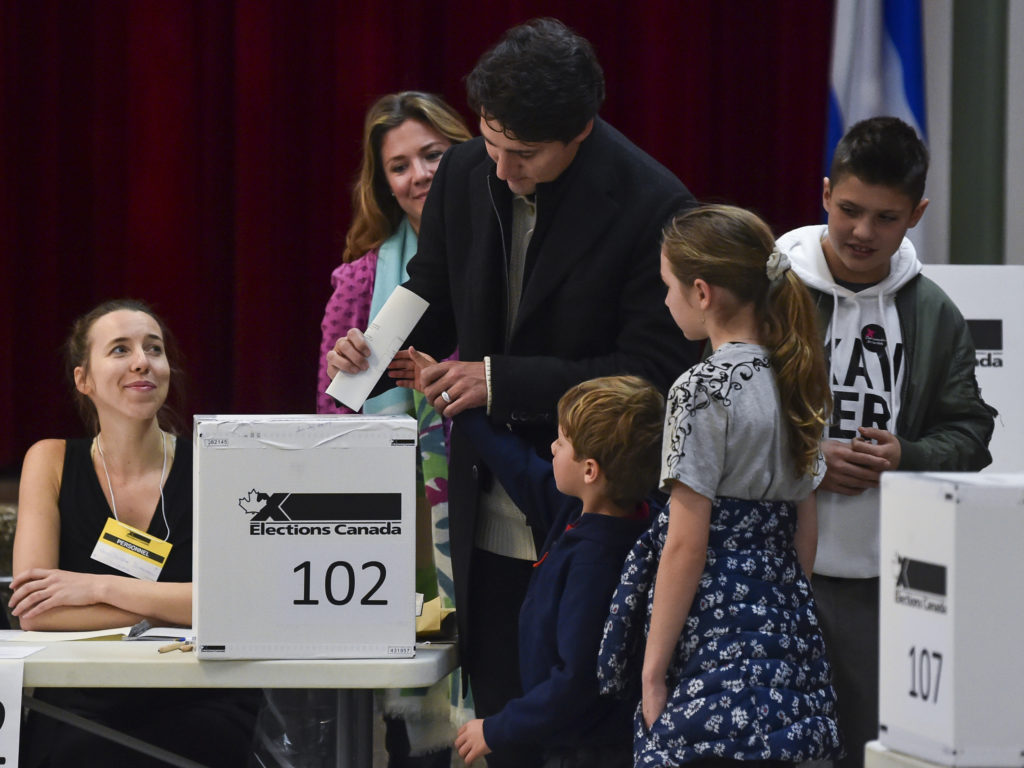 Canadian Prime Minister Justin Trudeau is surrounded by his family as he casts his vote on election day. (Minas Panagiotakis/Getty Images)