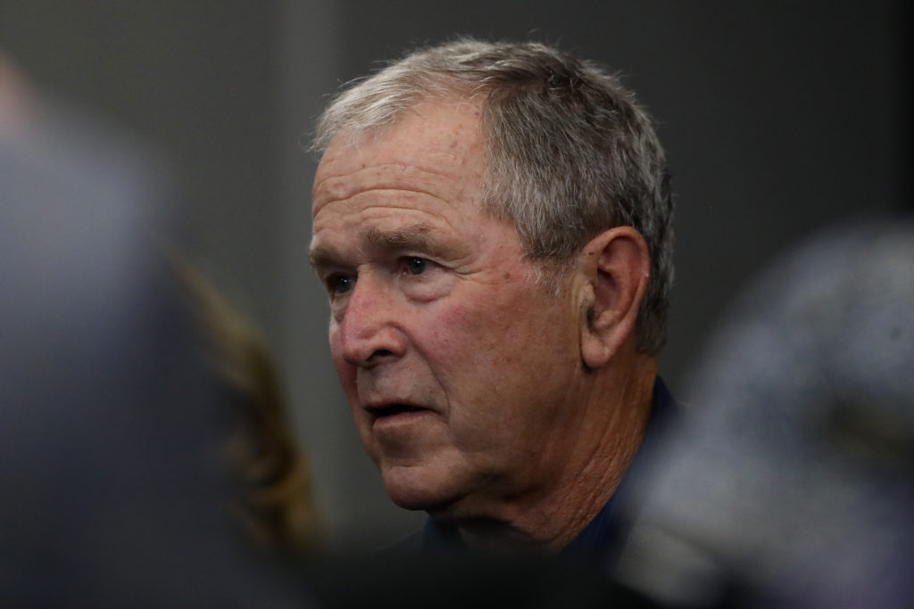Former President George W. Bush attends the NFL game between the Dallas Cowboys and the Green Bay Packers. (Ronald Martinez/Getty Images)