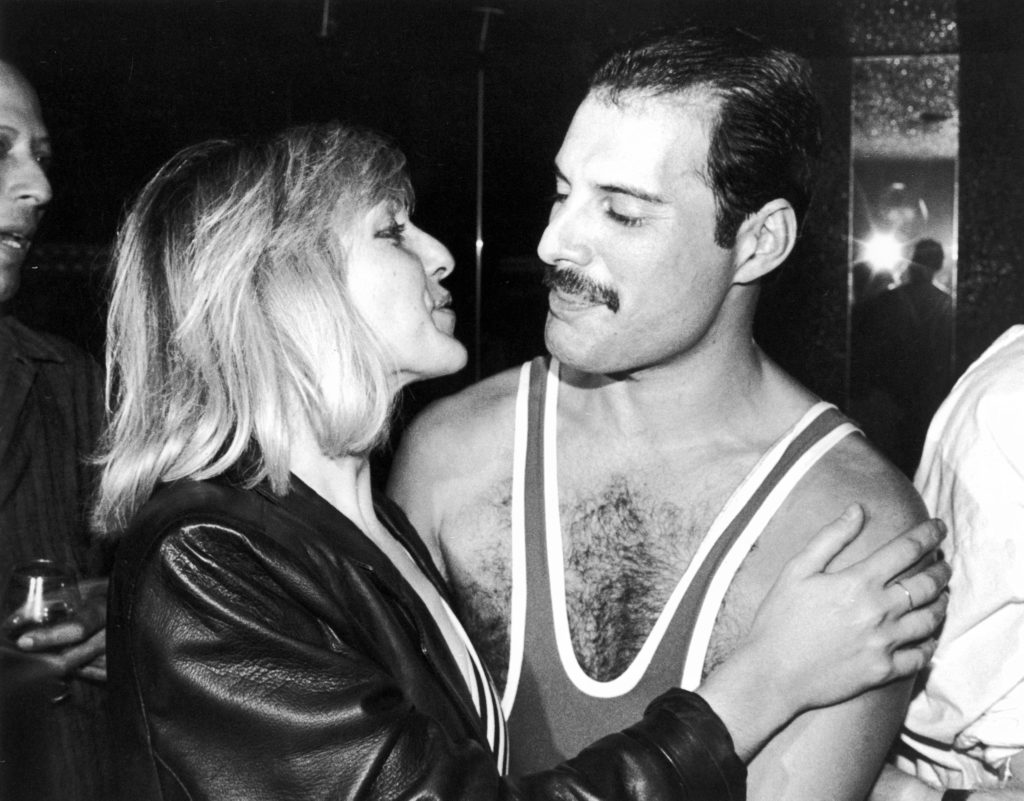 Freddie Mercury with Mary Austin, during Mercury's 38th birthday party at the Xenon nightclub, London, UK, September 1984. (Dave Hogan/Getty Images)