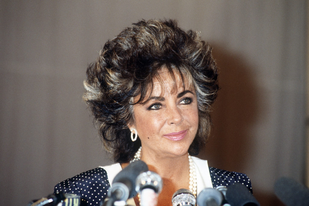 US actress Elizabeth Taylor attends an AIDS rally in 1985