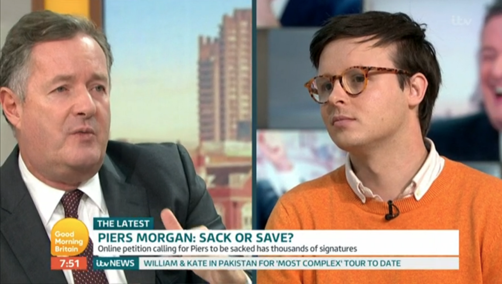 Piers Morgan (L) debated with journalist Benjamin Butterworth on whether the Good Morning Britain should should be sacked for his anti-trans comments. (Screen capture via ITV)