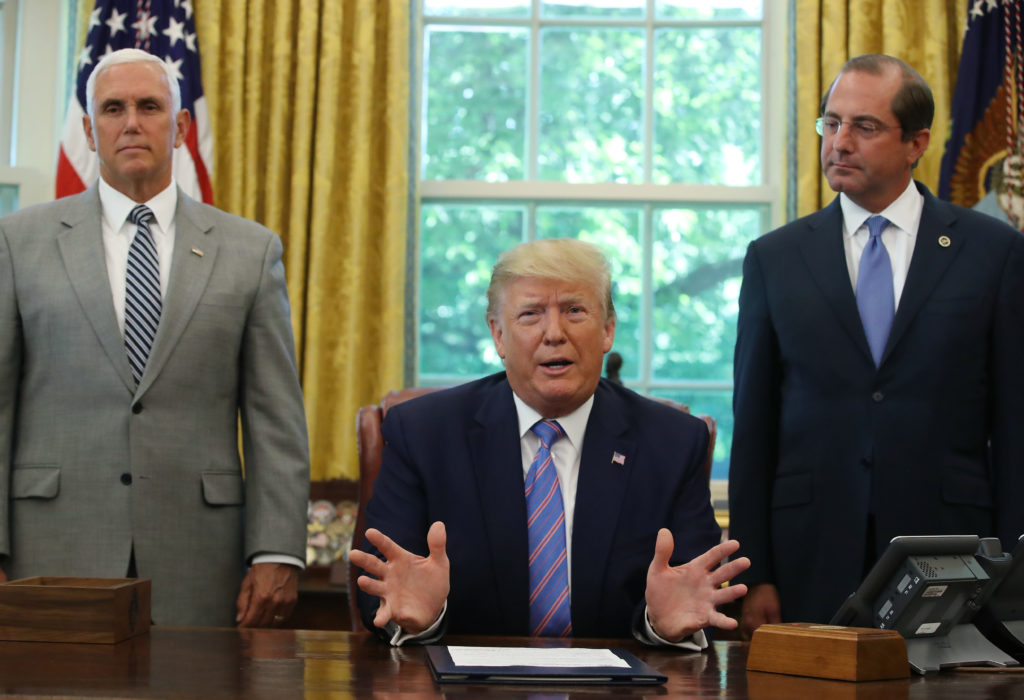 Trump adoption rule: President Donald Trump with Vice President Mike Pence and Health and Human Services (HHS) Secretary Alex Azar