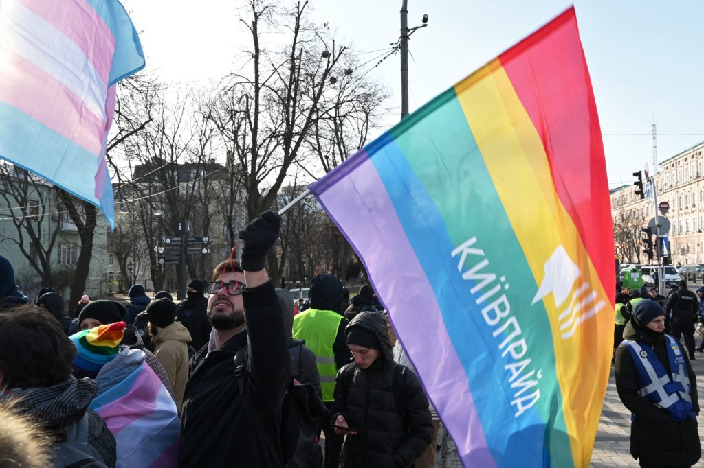 A man holds an Rainbow flag during an anti-transphobia rally in Kiev on November 23, 2019.. (GENYA SAVILOV/AFP via Getty Images)