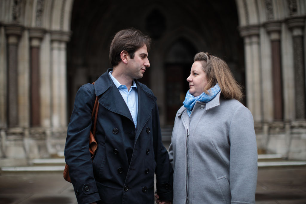 Charles Keidan and Rebecca Steinfeld look into each other's eyes as they pose outside the Royal Courts of Justice, Strand on February 21, 2017 in London, England. 