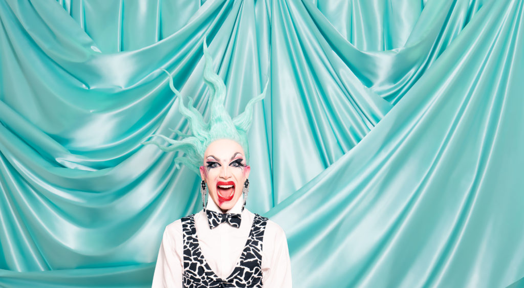 Sasha Velour in a spiky turquoise wig