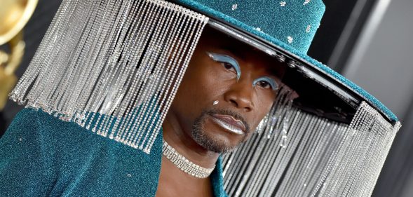 Billy Porter at the Grammys in a crystal fringed hat