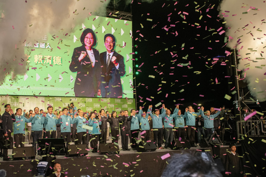 President elected Tsai Ing-wen flanked by her running mate William Lai and her party, DPP, heavyweight thanks the large crowd gathered in front of the Taipei DPP Headquarters. (Alberto Buzzola/LightRocket via Getty Images)