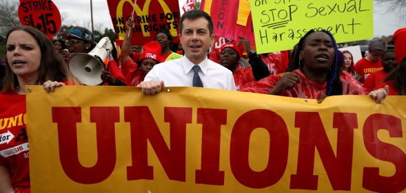 Democratic presidential candidate Pete Buttigieg marches with South Carolina McDonald’s workers as they demonstrate for a $15 an hour wage and the right to form a workers union. (Win McNamee/Getty Images)