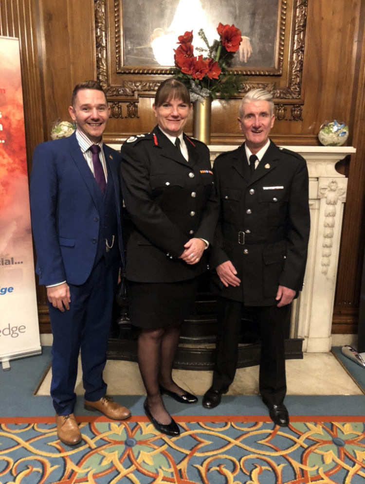 Pat Carberry (R) with his husband David and Dany Cotton, former London Fire Brigade Commissioner. (Supplied)