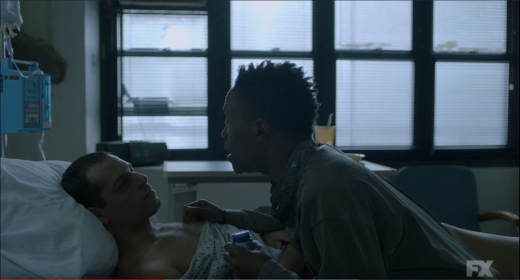 Pray Tell, played by Billy Porter, visits his lover in hospital during Pose season one