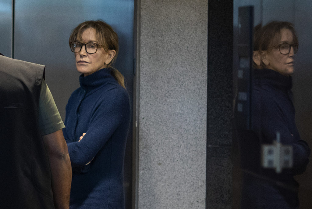 Felicity Huffman was among 50 people indicted in a nationwide university admissions scam. (DAVID MCNEW/AFP via Getty Images)