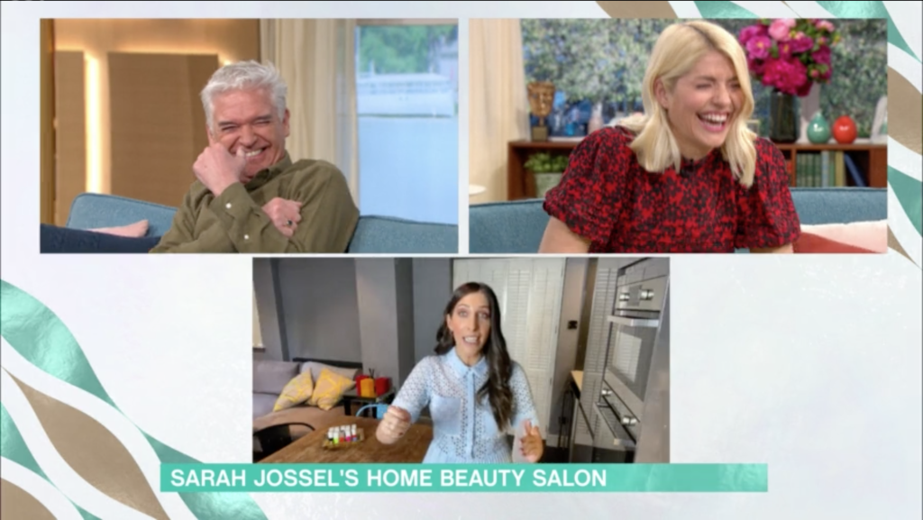 Philip Schofield and Holly Willoughby began giggling off-screen, forcing a bemused Sarah Jossel to dare to ask what the pair were chuckling about. (Screen capture via ITV)