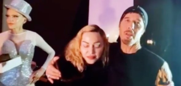 Madonna hugging Steven Klein