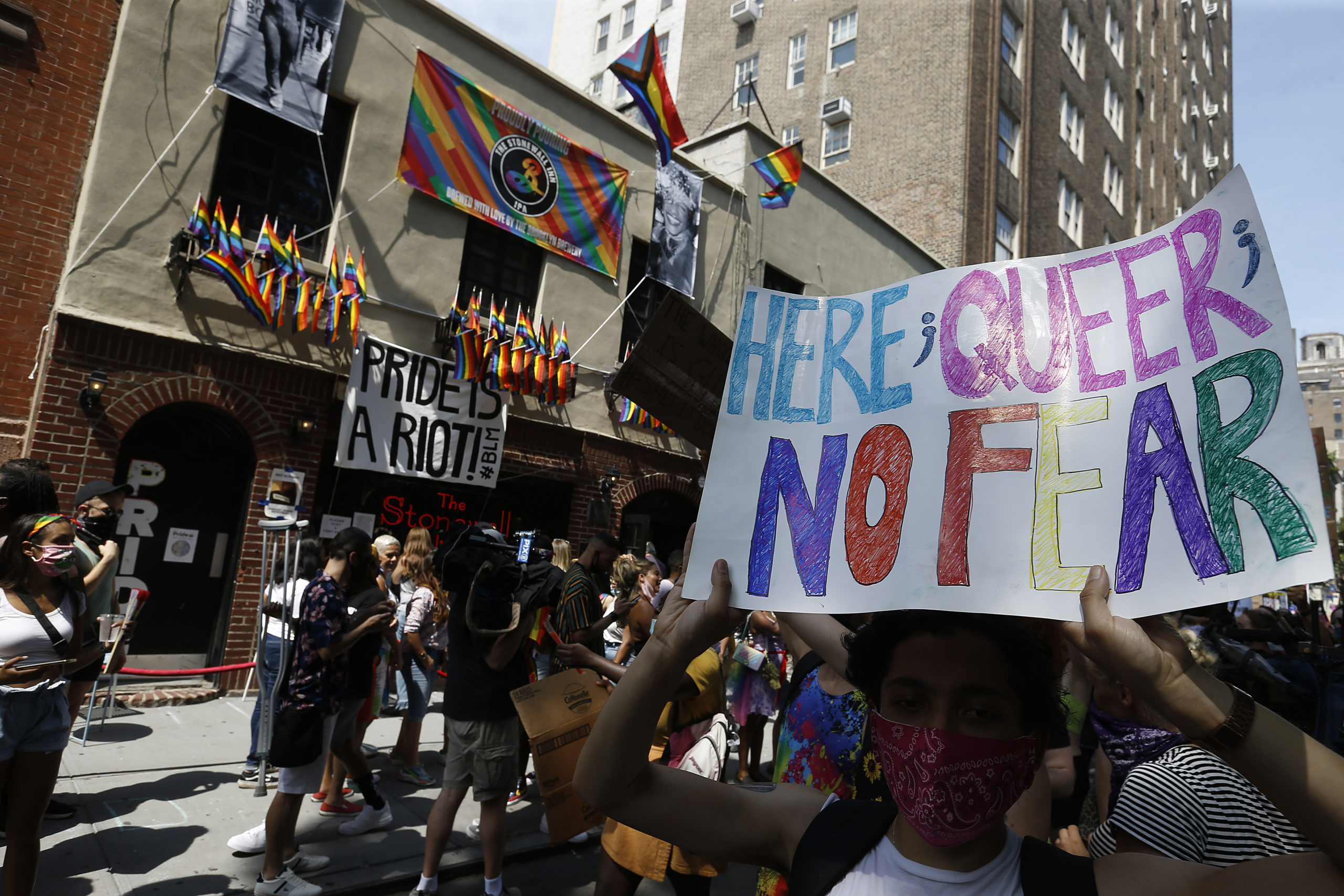 Marchers congregate in front of the Stonewall Inn during the Queer Liberation March for Black Lives & Against Police Brutality on June 28, 2020. 