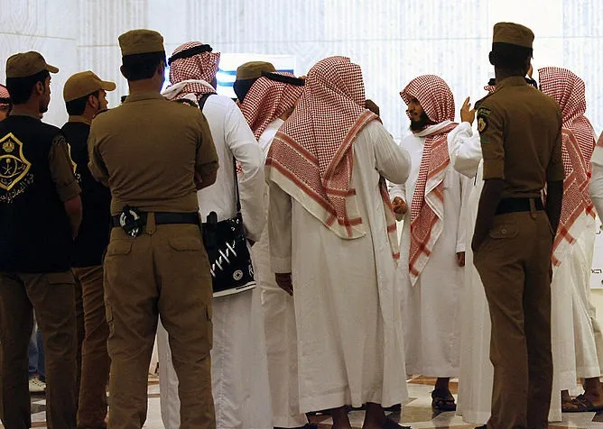 File photo. Police in Saudi Arabia stand guard