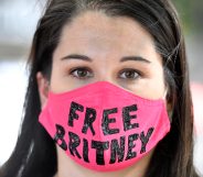 A #FreeBritney supporter wearing a pink face mask