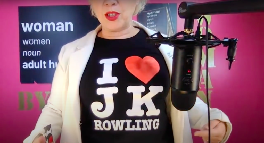 Posie Parker posed in a YouTube broadcast to show off a t-shirt emblazoned with "I ❤ JK Rowling". (Screen capture via YouTube)