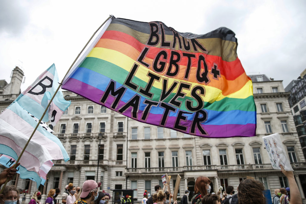 Pride flag with text: Black LGBT+ Lives Matter covid-19