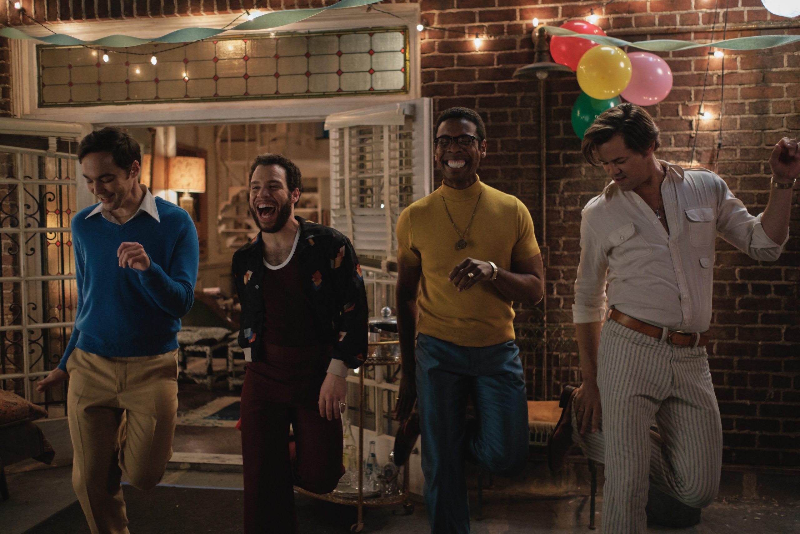 Jim Parsons as Michael, Robin De Jesus as Emory, Michael Benjamin Washington as Bernard and Andrew Rannells as Larry in The Boys in the Band 