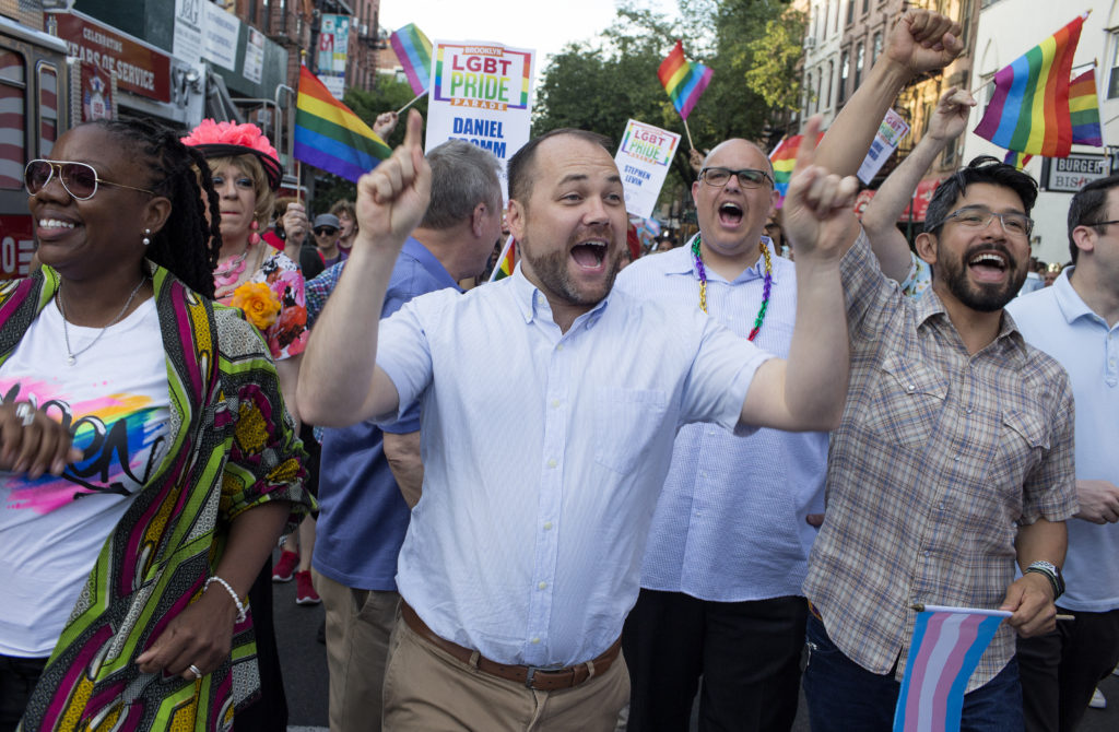  New York City Council Speaker Corey Johnson dances with other members of the city council at Brooklyn's annual LGBT+ Pride Parade. (Andrew Lichtenstein/Corbis via Getty Images)