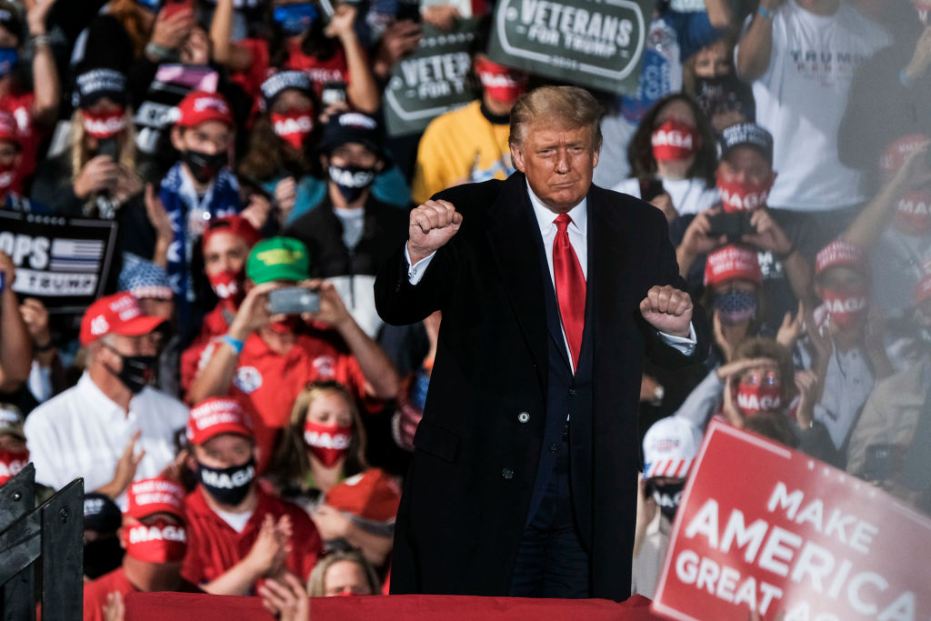 President Donald Trump charges up the crowd while speaking of the need to win the upcoming election during a campaign rally at the Toledo Express Airport on September 21, 2020 in Swanton, Ohio. 