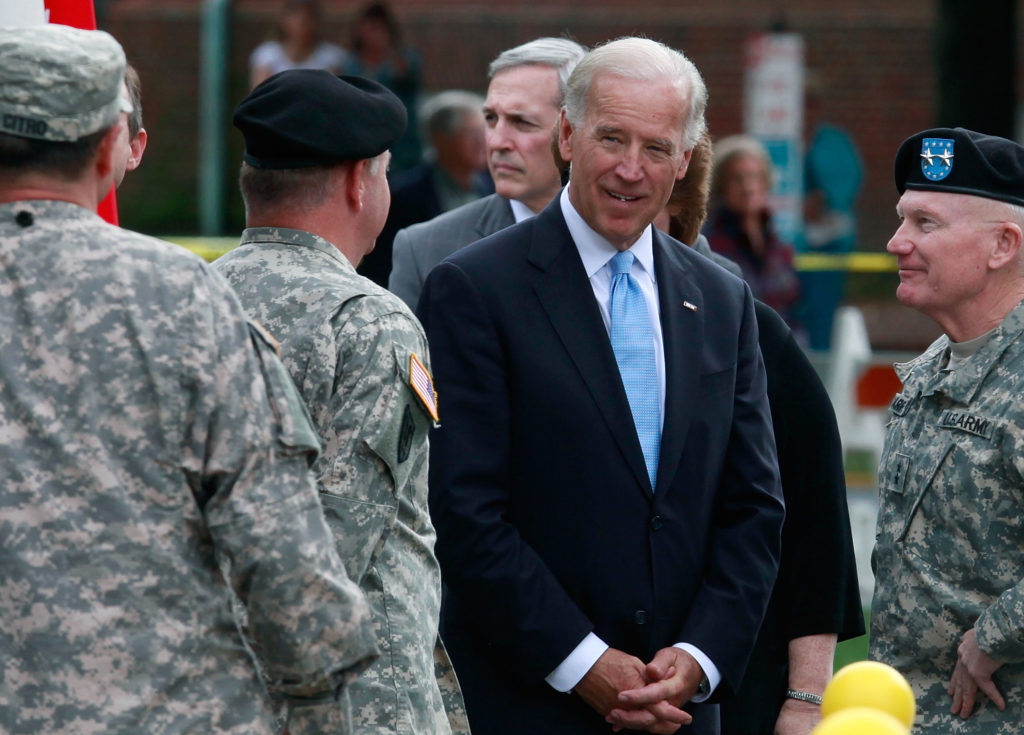 Then Vice President Joe Biden talks with members of the Delaware Army National Guard 261st Signal Brigade. (Mark Wilson/Getty Images)