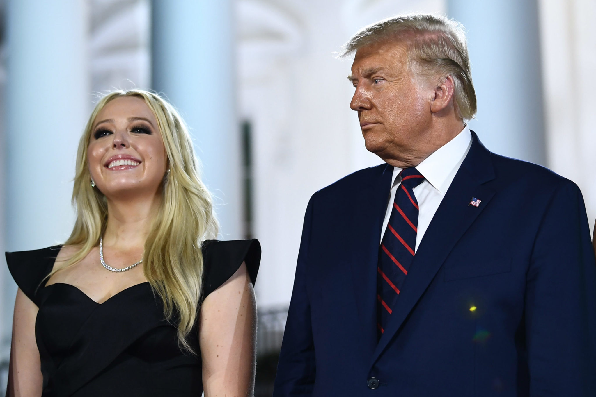 US President Donald Trump stands with daughter Tiffany Trump after he delivered his acceptance speech for the Republican Party nomination for reelection during the final day of the Republican National Convention at the South Lawn of the White House in Washington, DC on August 27, 2020. 