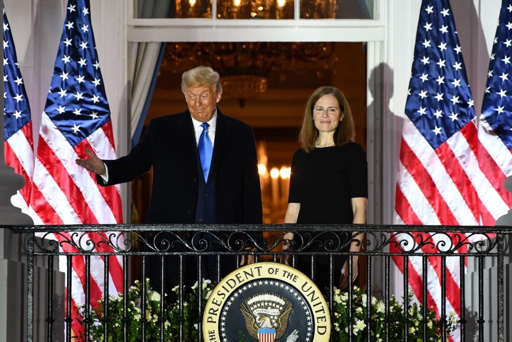 Donald Trump and Amy Coney Barrett stood on a White House balcony