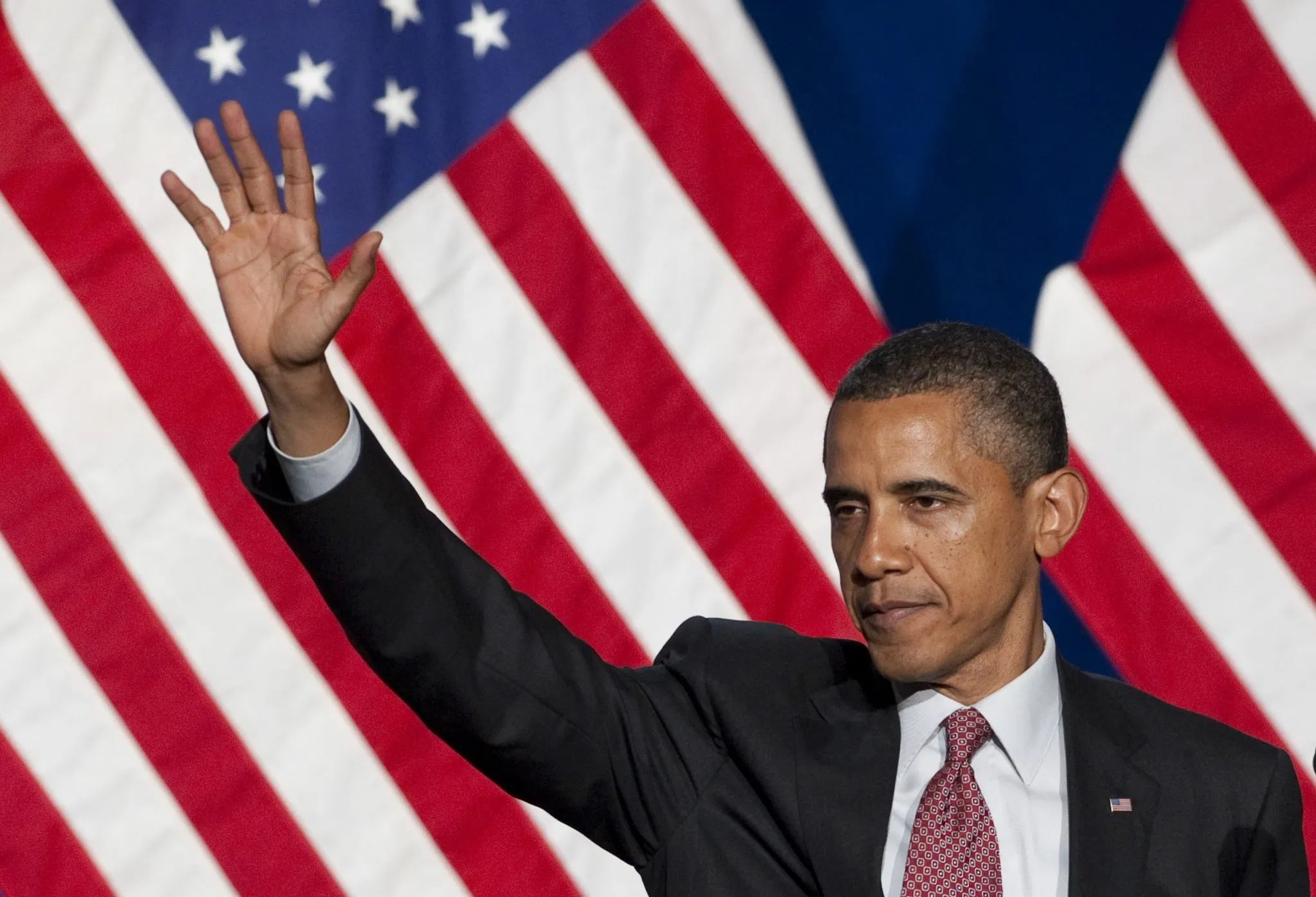US President Barack Obama waves after speaking at the Democratic National Committee's Lesbian Gay Bisexual Transgender Leadership Gala in New York, June 23, 2011