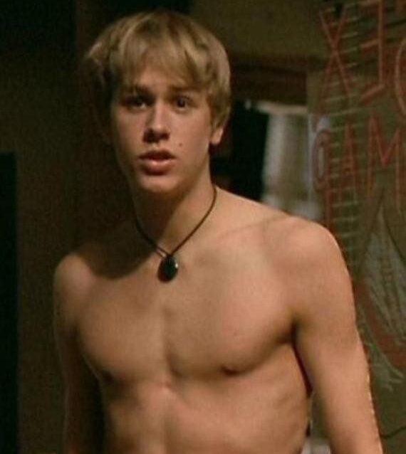 Charlie Hunnam as Nathan in Queer as Folk, standing topless
