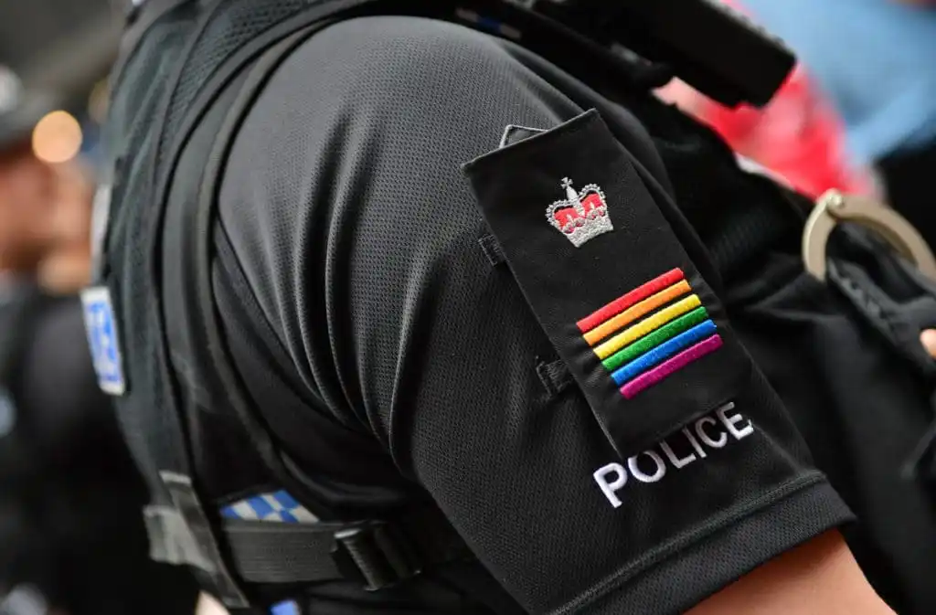 A police officer wearing rainbow epaulettes at Pride in London
