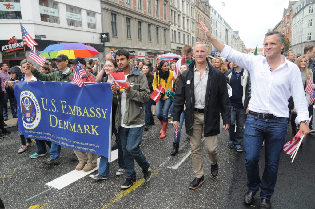 Rufus Gifford (R) and his husband Stephen De Vincent (2nd R) take part in the annual Copenhagen LGBT+ Parade 2014 in Denmar