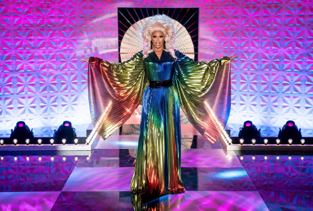 RuPaul in a long-sleeved kaftan in the colours of the rainbow
