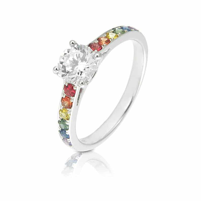 A wedding ring featuring rainbow stones. (Etsy/Equalli)
