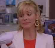 Samantha Jones holding a back massager