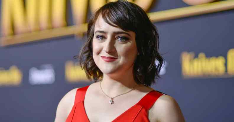 Mara Wilson in a red dress