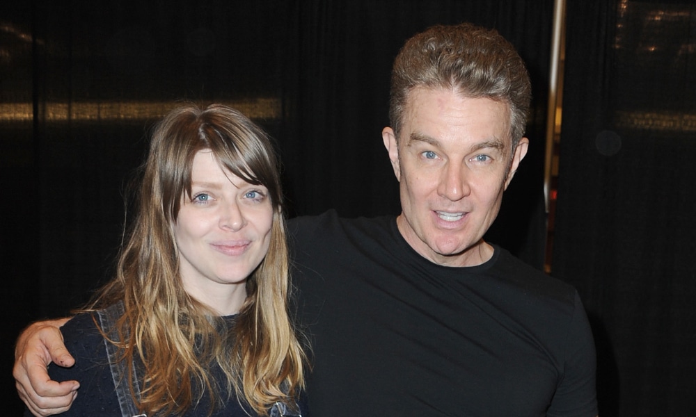 James Marsters with his arm around Amber Benson
