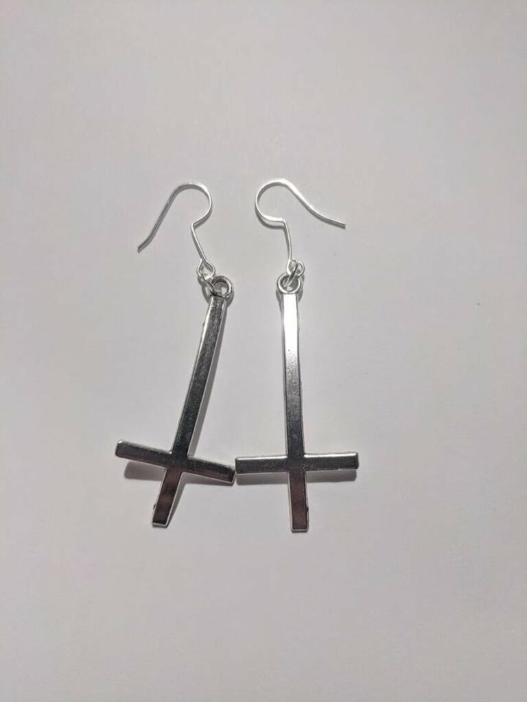 A pair of satanic dangly earrings. (Etsy/Liquidbreed)